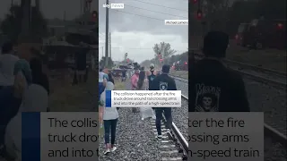 Train smashes into fire truck