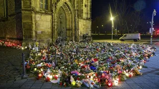 THE MARKET LIMITED Candles and flowers flood makeshift memorial for Magdeburg market attack