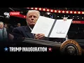 Trump signs executive orders at inauguration parade in Washington