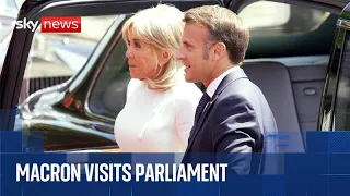 French President Emmanuel Macron lays a wreath at the statue of Sir Winston Churchill