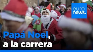 Papá Noel se lanza multiplicado en maratones benéficos por toda Europa