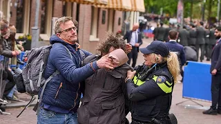 Guarda: Manifestanti interrompono la cerimonia del Giorno della Liberazione olandese