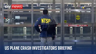 US National Transportation Safety Board officials give a briefing on the Washington plane crash