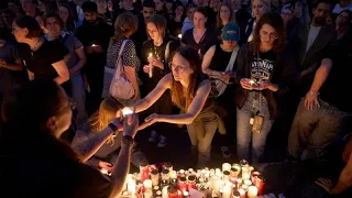 Graz residents hold mass, vigil to mourn victims of deadly shooting