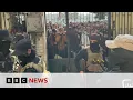 Assad's soldiers give up their weapons in Syrian 'reconciliation centres' | BBC News