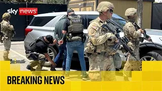 Riot police and National Guard set to enforce LA curfew as violence continues